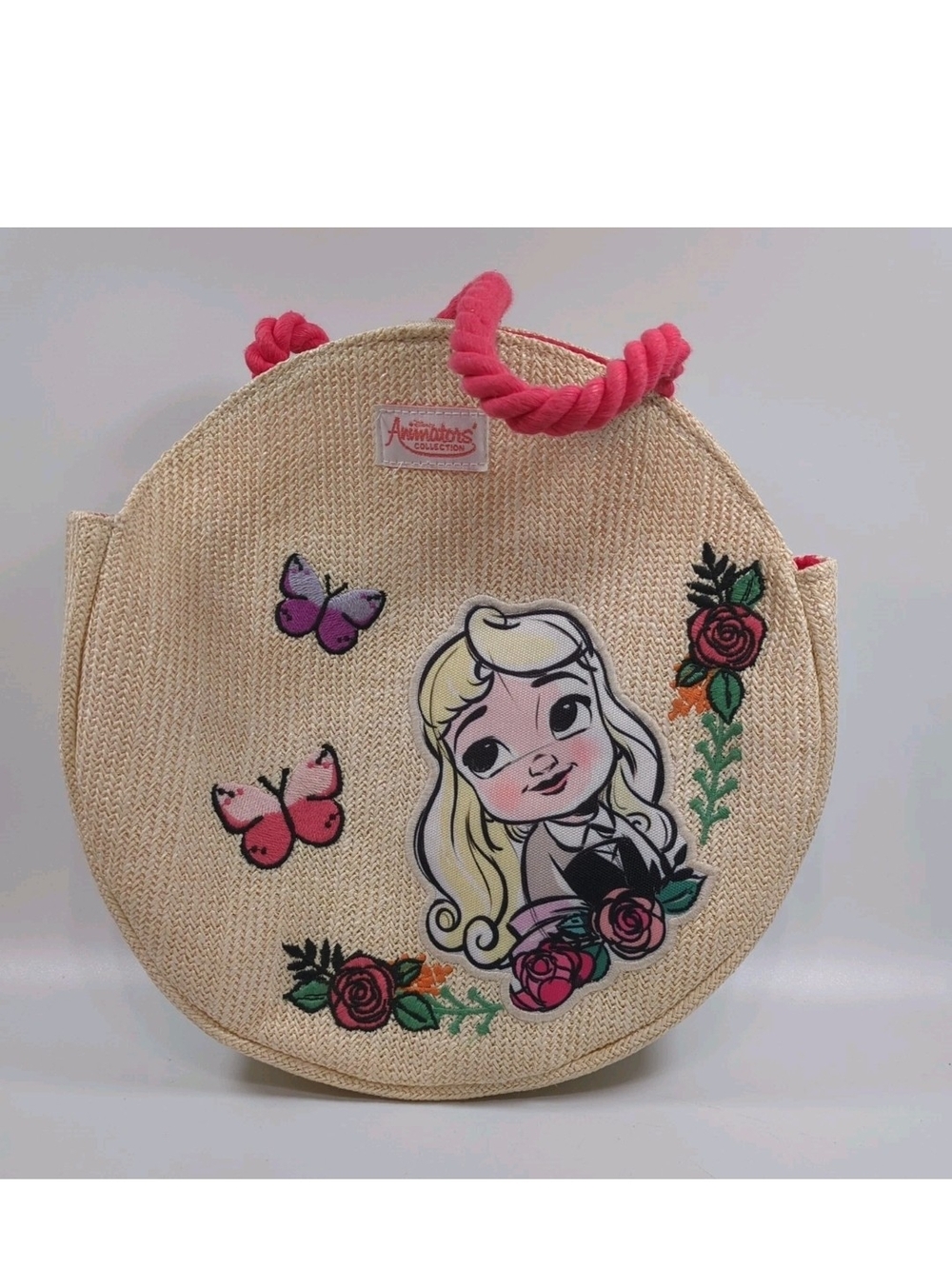 Disney Beige Round Tote with Pink Handles and Floral/Butterfly Art